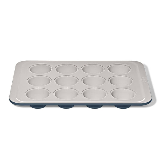 non-stick-pro-ceramic-coated-metal-bakeware-12-cup-muffin-pan-storm-blue-q2 oxo_12-cup-muffin-pan-stormblue_apdp_00_main.jpg